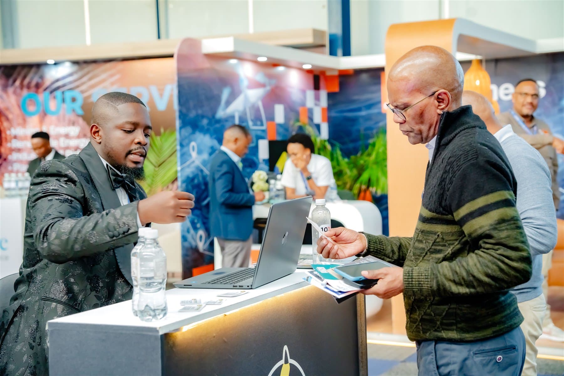 Nagpal Holdings representatives speaking with clients